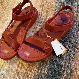 Red Teva sandals size 10
